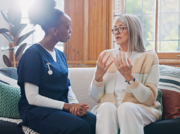 Nurse listening to patient