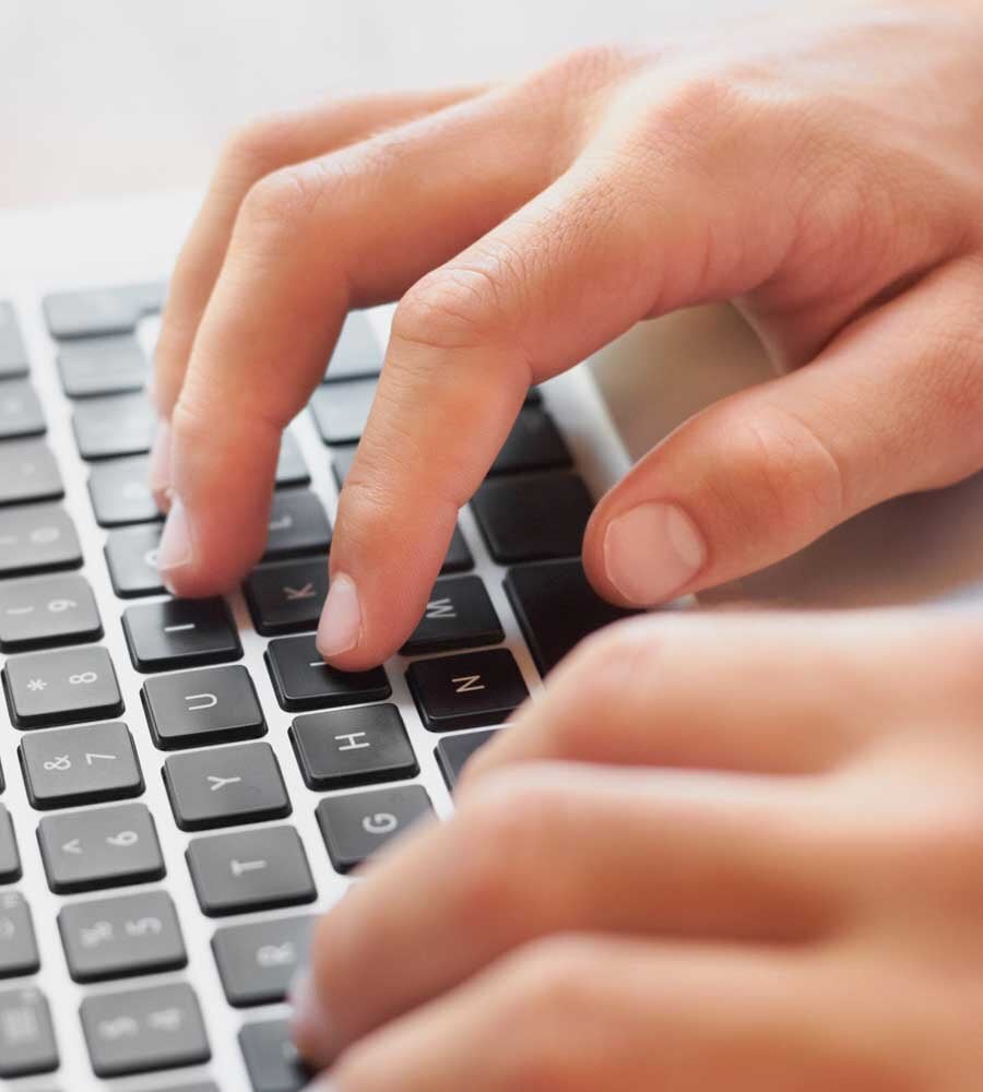 hands on computer keyboard