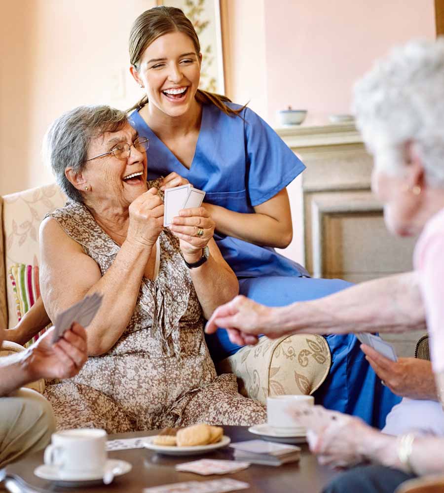 nurse and women playing cards