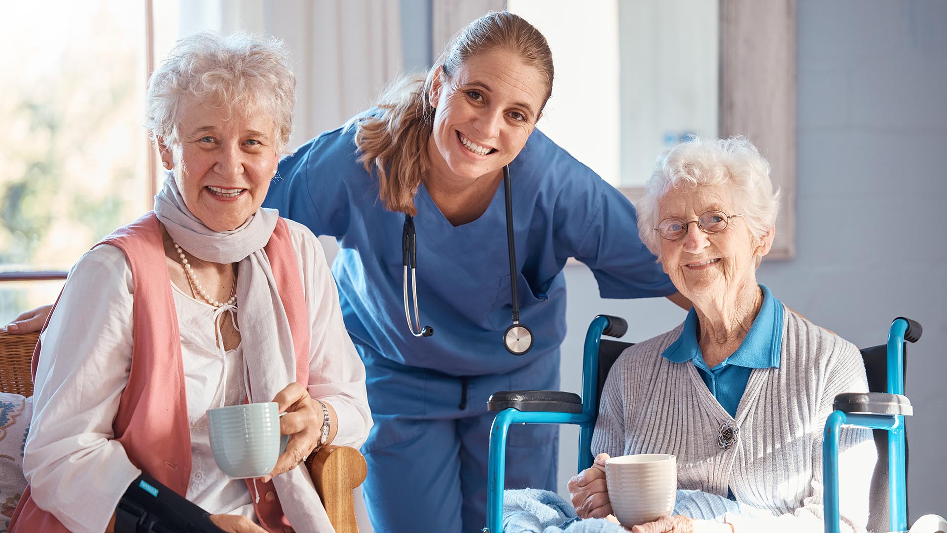 Nursing home nurse with two seniors